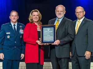 Bill Yenne receiving the Air Force Association Gill Robb Wilson Award for the “most outstanding contribution in the field of arts and letters.” Left to right are Chief of Staff of the Air Force General David Goldfein, Secretary of the Air Force Deborah Lee James, Bill, and AFA Chairman Scott Van Cleef.
